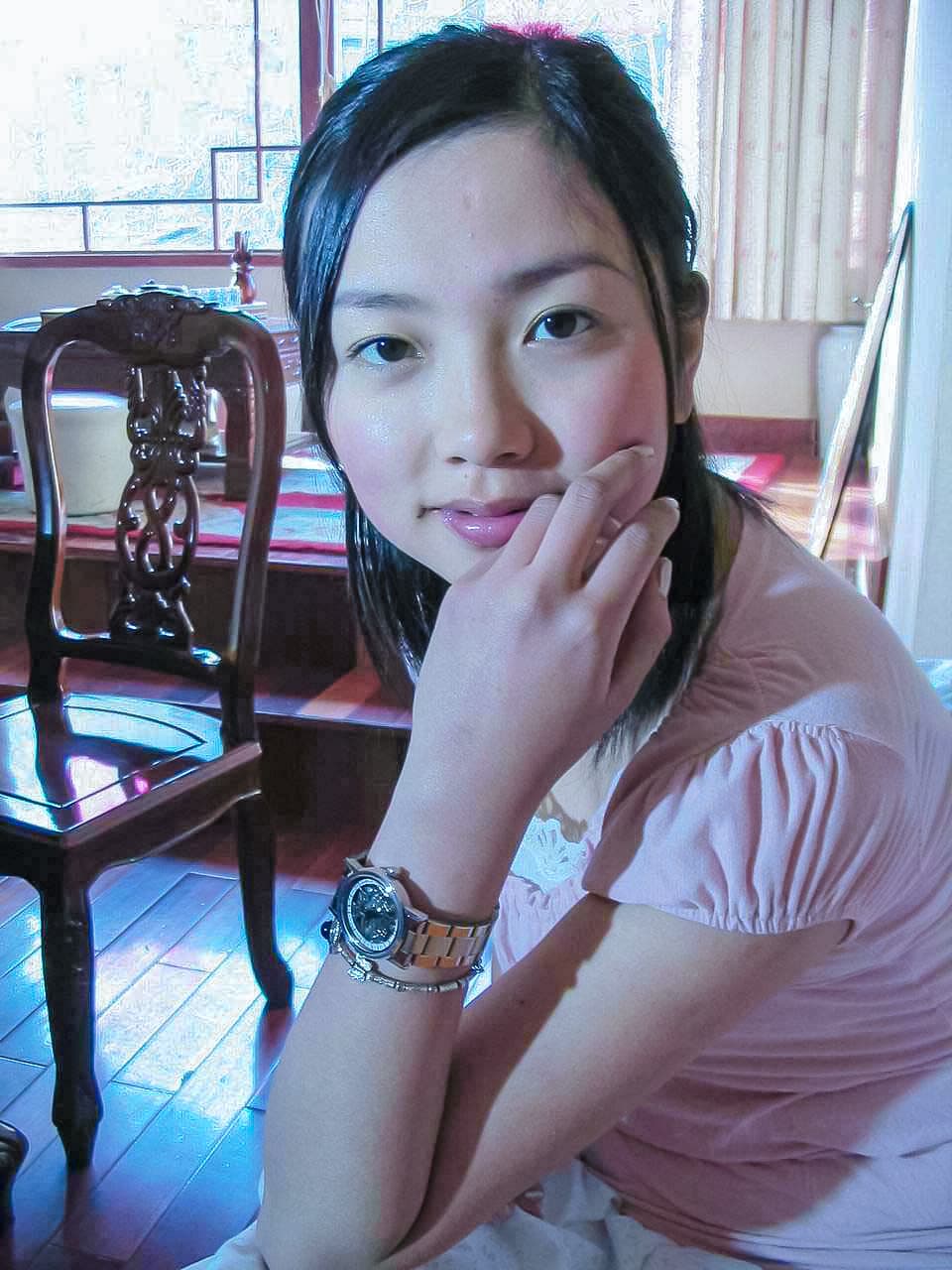 Detail shot of sock fibers against leather heel, arch elevated and toes pressing into the shoe